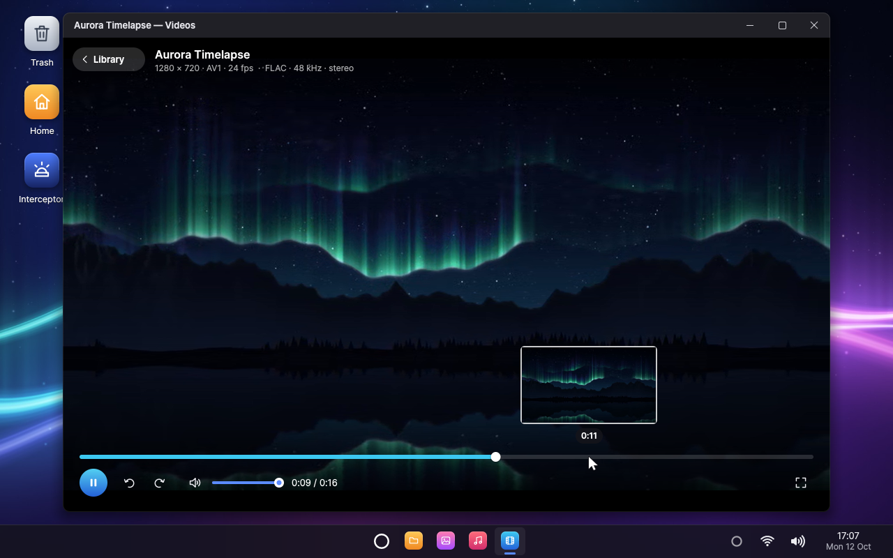 Videos playing an aurora timelapse, a picture from further on above its seek bar