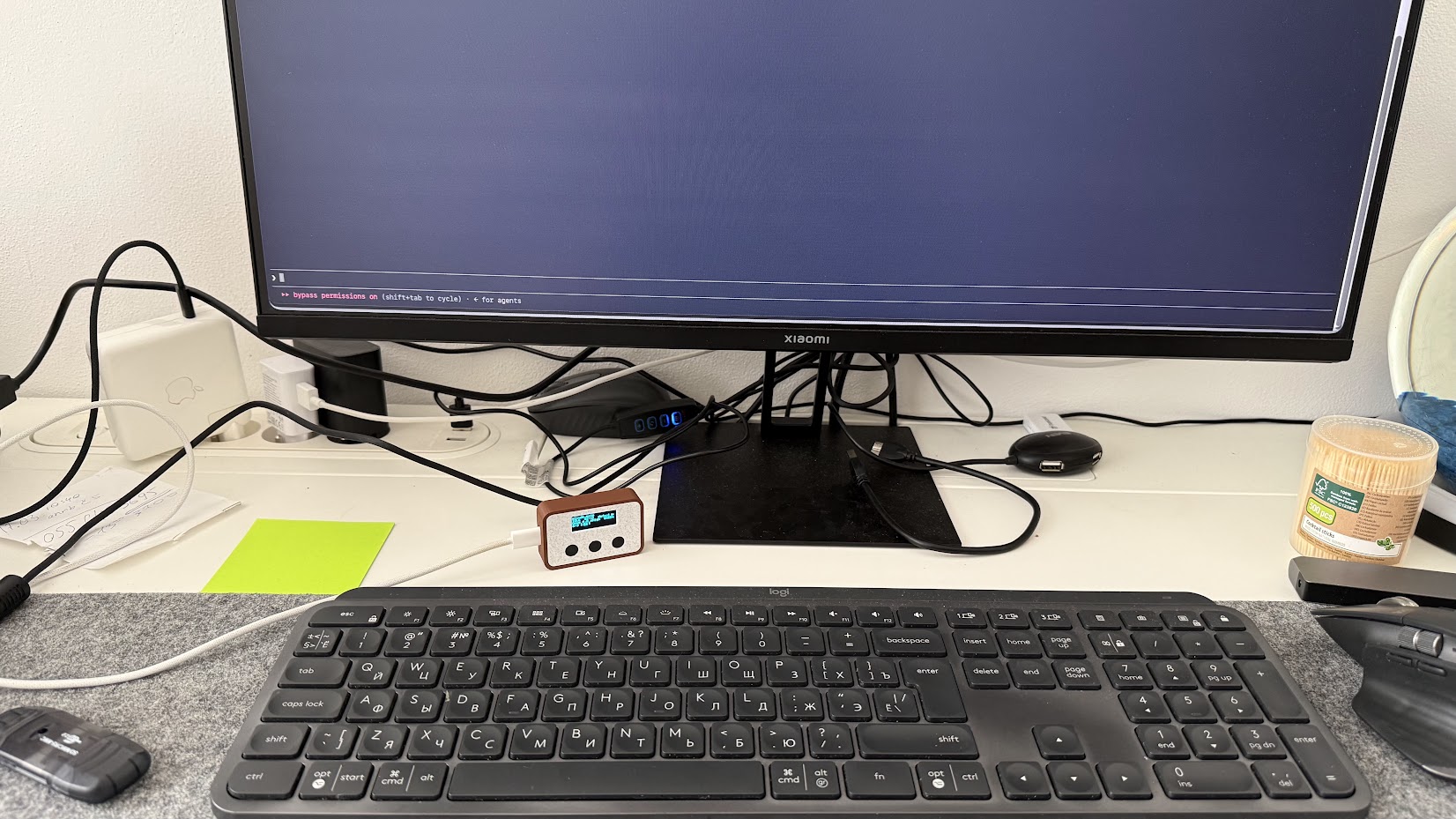 Claude Mate on a desk in front of the monitor