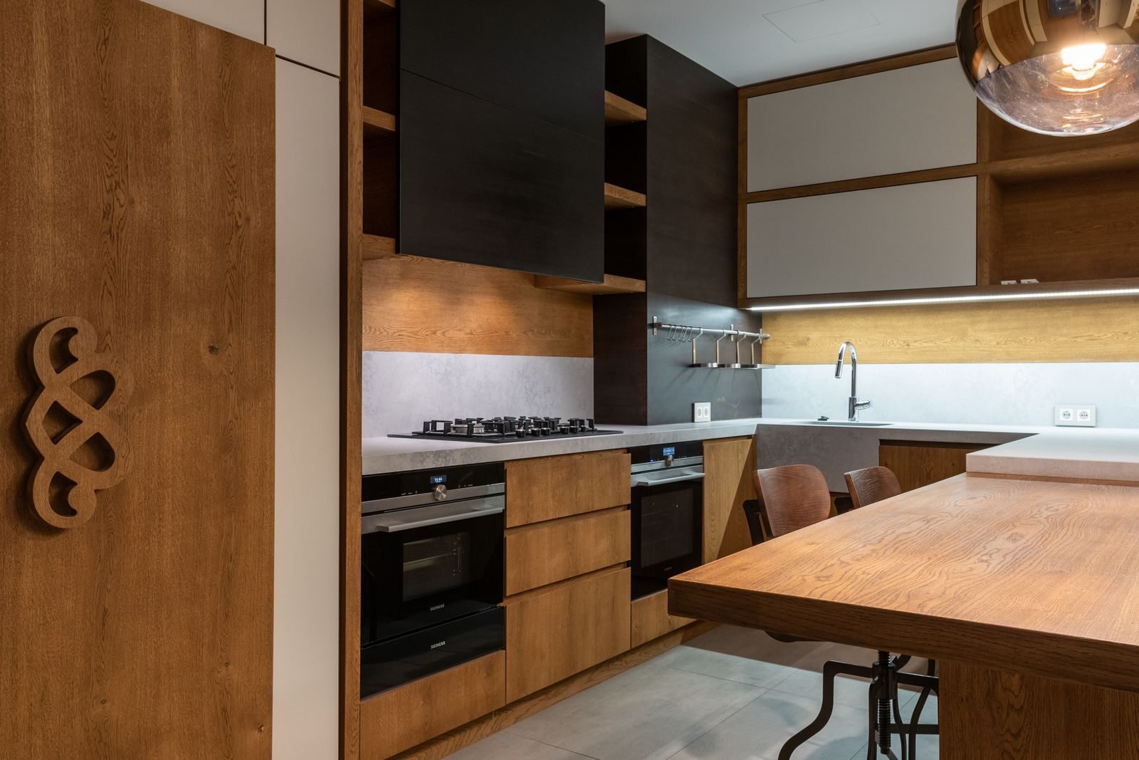 Modern kitchen with island and pendant lighting