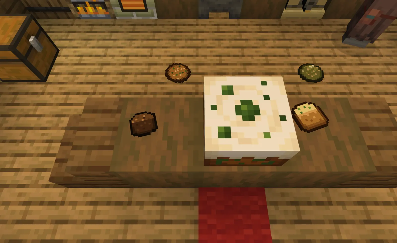 A cake, cookies and toast on a kitchen table