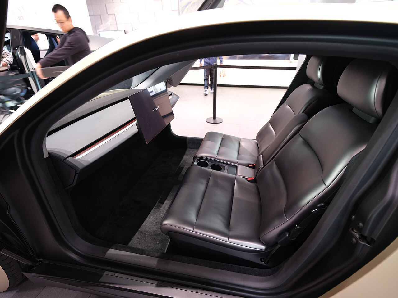 Cybercab interior: two seats, large central display, no steering wheel anywhere