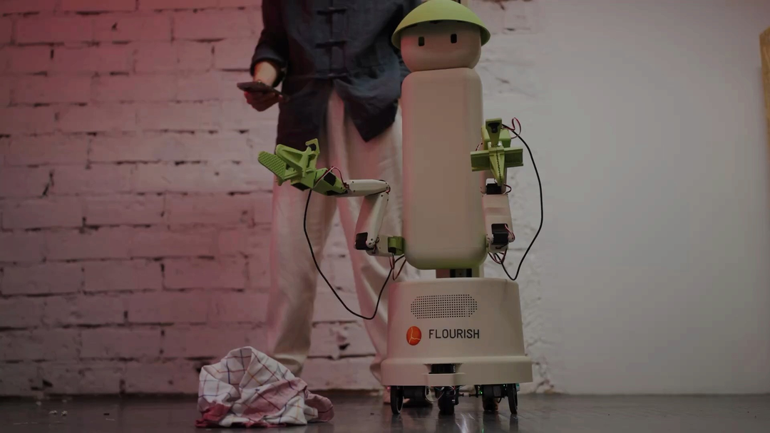 Flourish 1 in an official promotional scene with clothing beside its arms