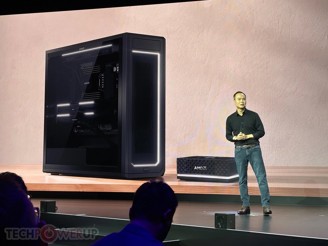 AMD CEO on stage next to the Halo Station tower