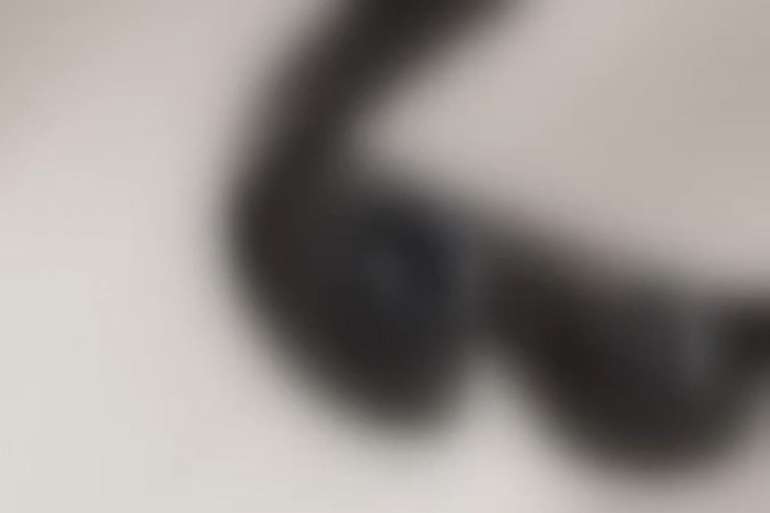 Blurred still from the leaked Project Phoenix setup video showing the nose pad assembly