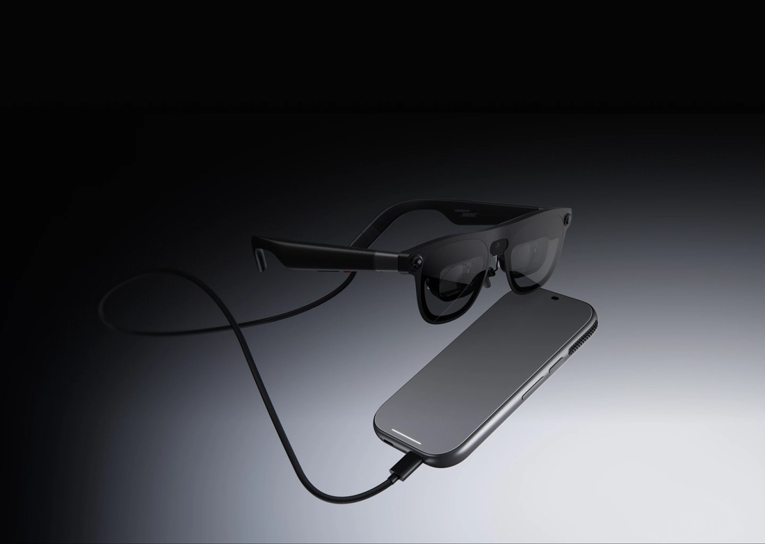 Official XREAL AURA product image showing its glasses and computing puck
