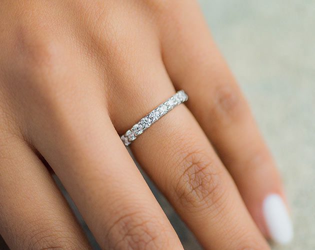 Platinum Ladies 1.00CTW.* Angled Common Prong Diamond Eternity Ring