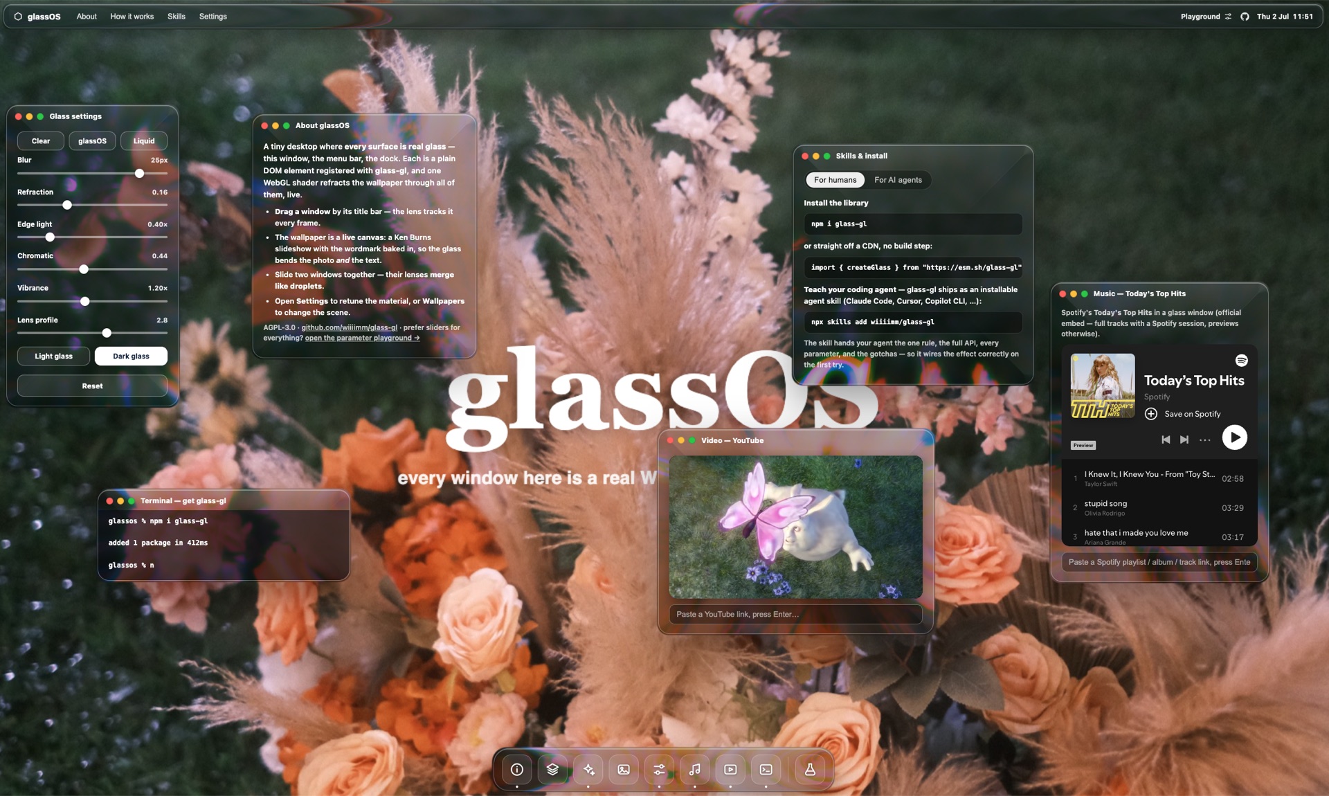 glassOS — a desktop made of glass-gl surfaces: menu bar, dock, and draggable app windows (including the Spotify Music and YouTube Video apps) refracting a floral wallpaper with the glassOS wordmark baked in