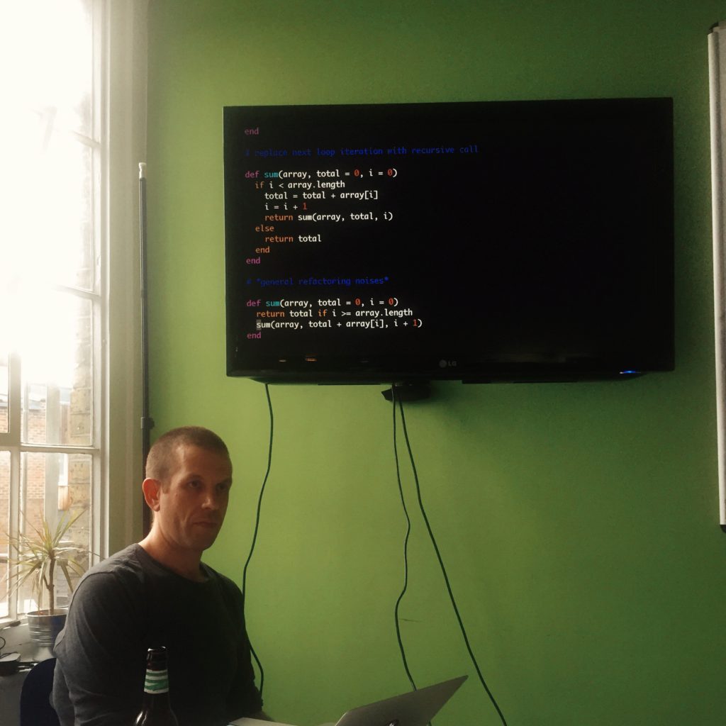 Tom showing how to convert an iterative solution into recursion