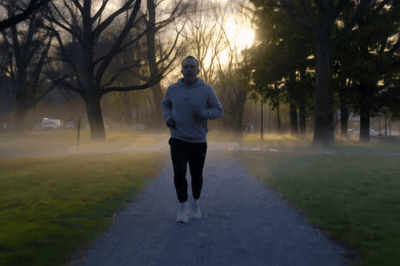 Eros Max, a man jogs in a park