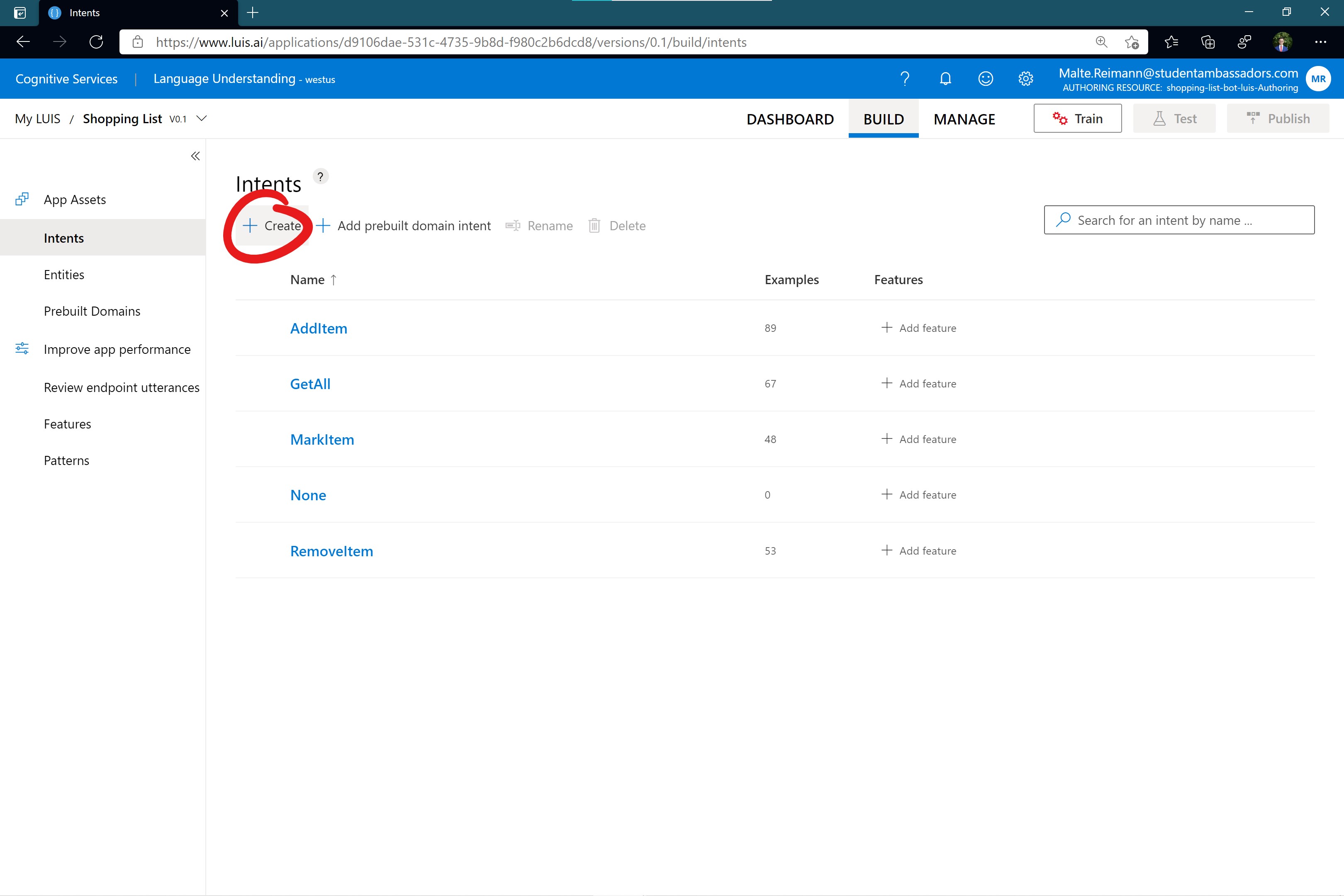 Screenshot of luis.ai 'Intents' page with default 'None', 'AddItem', 'GetAll', 'MarkItem' and 'RemoveItem' intents and red circle around '+ Create' button