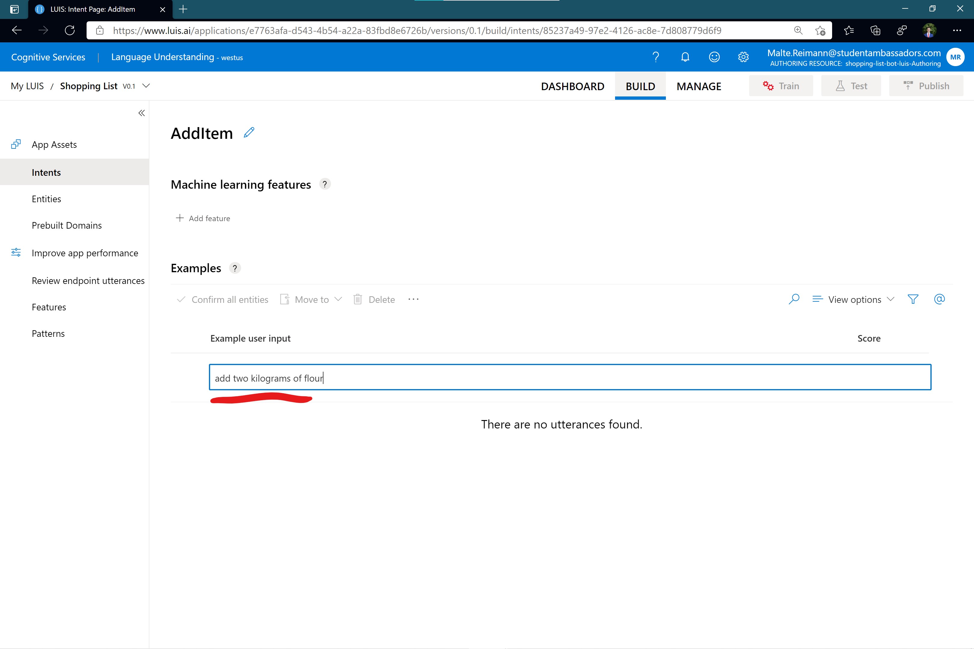 Screenshot of luis.ai 'AddItem' intent page with 'add two kilograms of flour' typed in as an example user input.