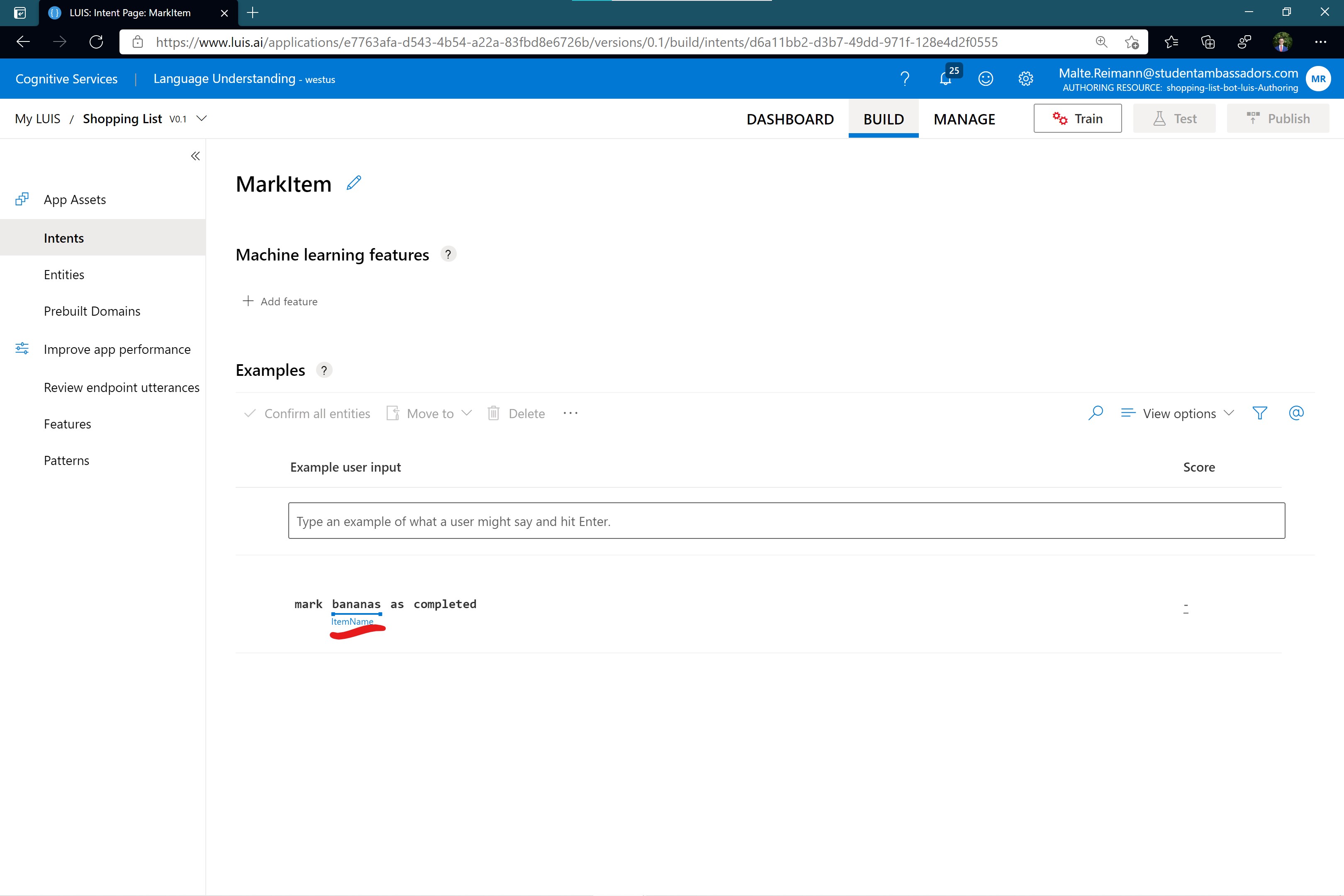 Screenshot of luis.ai 'MarkItem' intent page with word 'bananas' in example sentence marked as an entity of type 'ItemName'