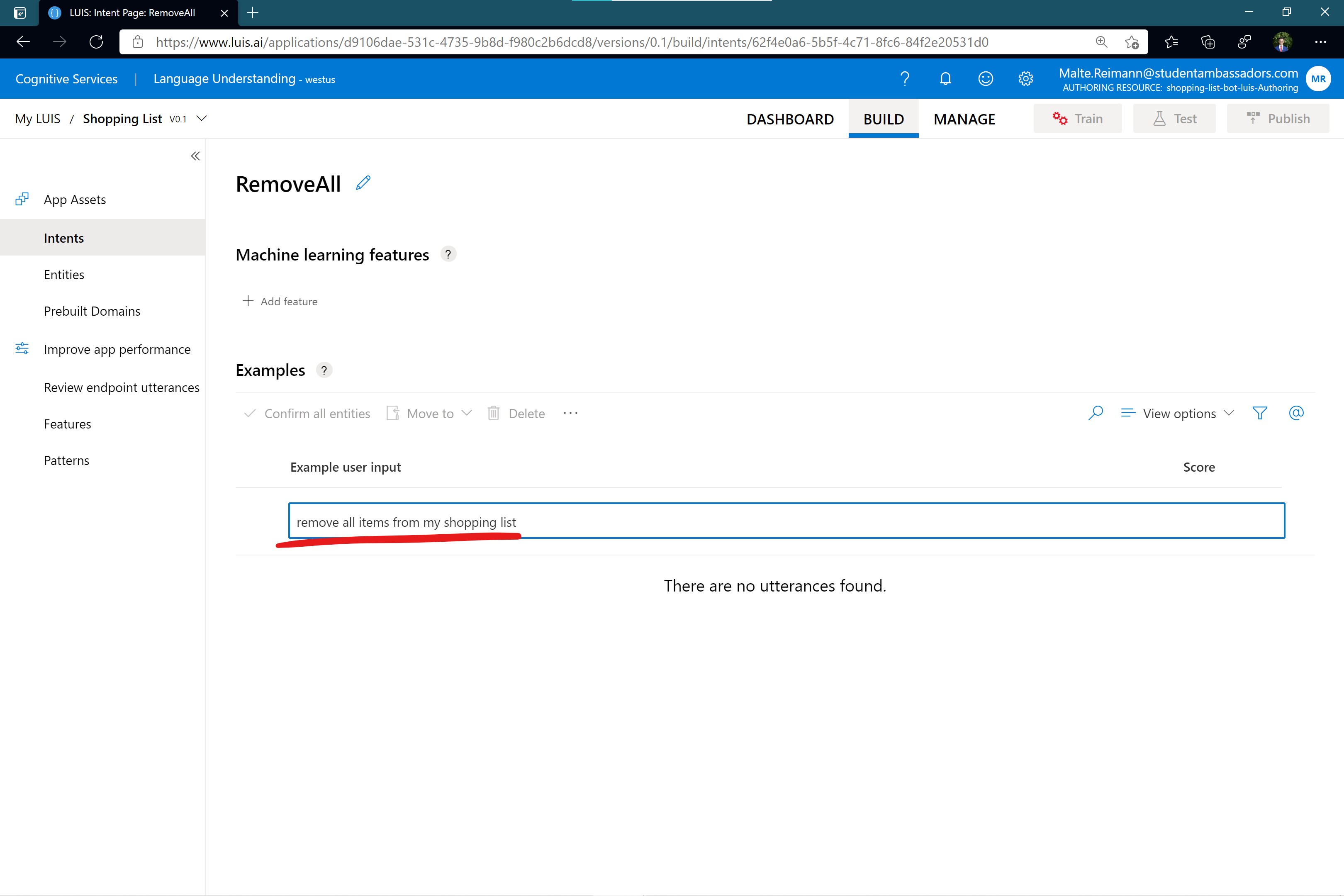 Screenshot of luis.ai 'RemoveAll' intent page with 'remove all items from my shopping list' typed in as an example user input.