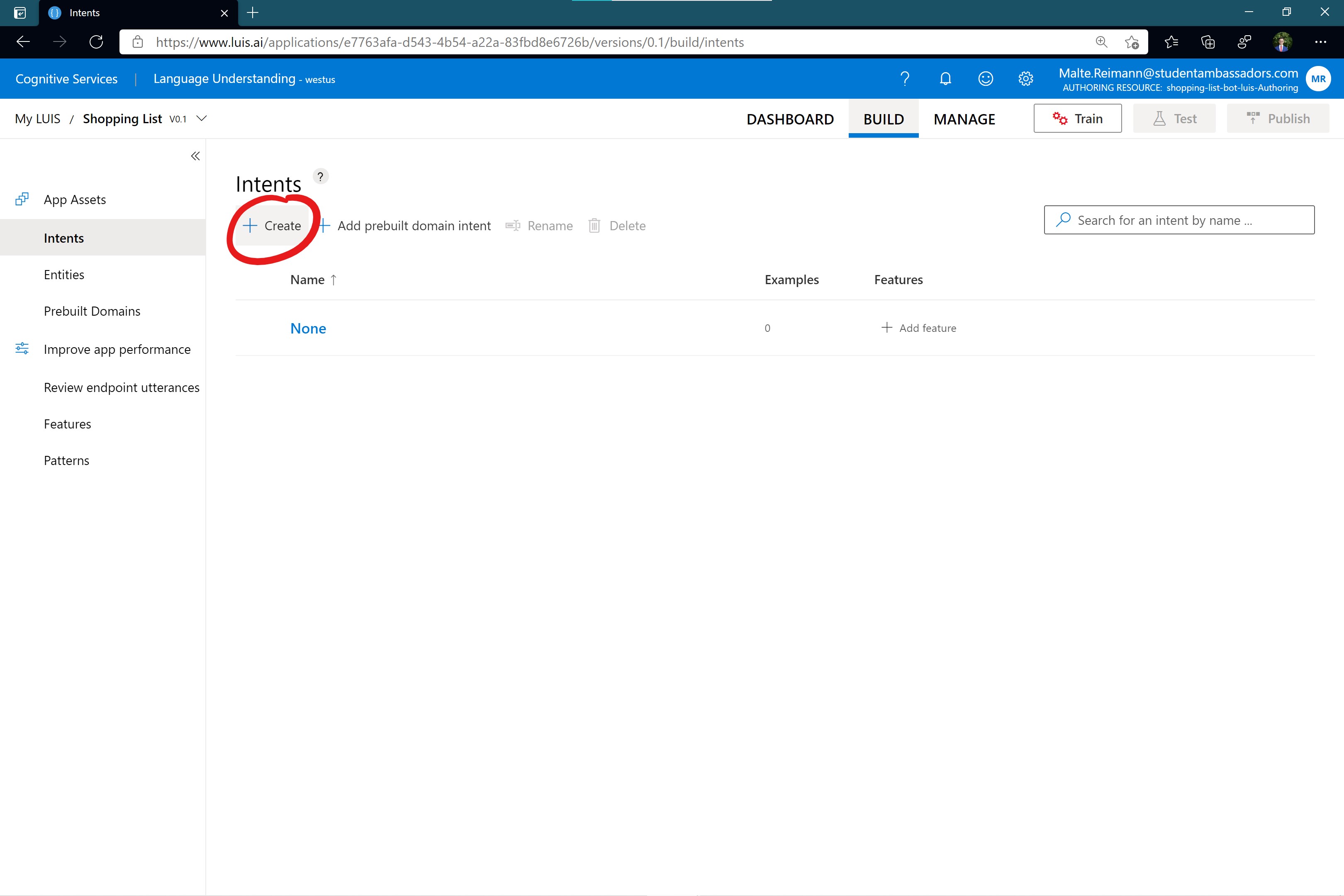 Screenshot of luis.ai 'Intents' page with default 'None' intent as only intent in the list and red circle around '+ Create' button