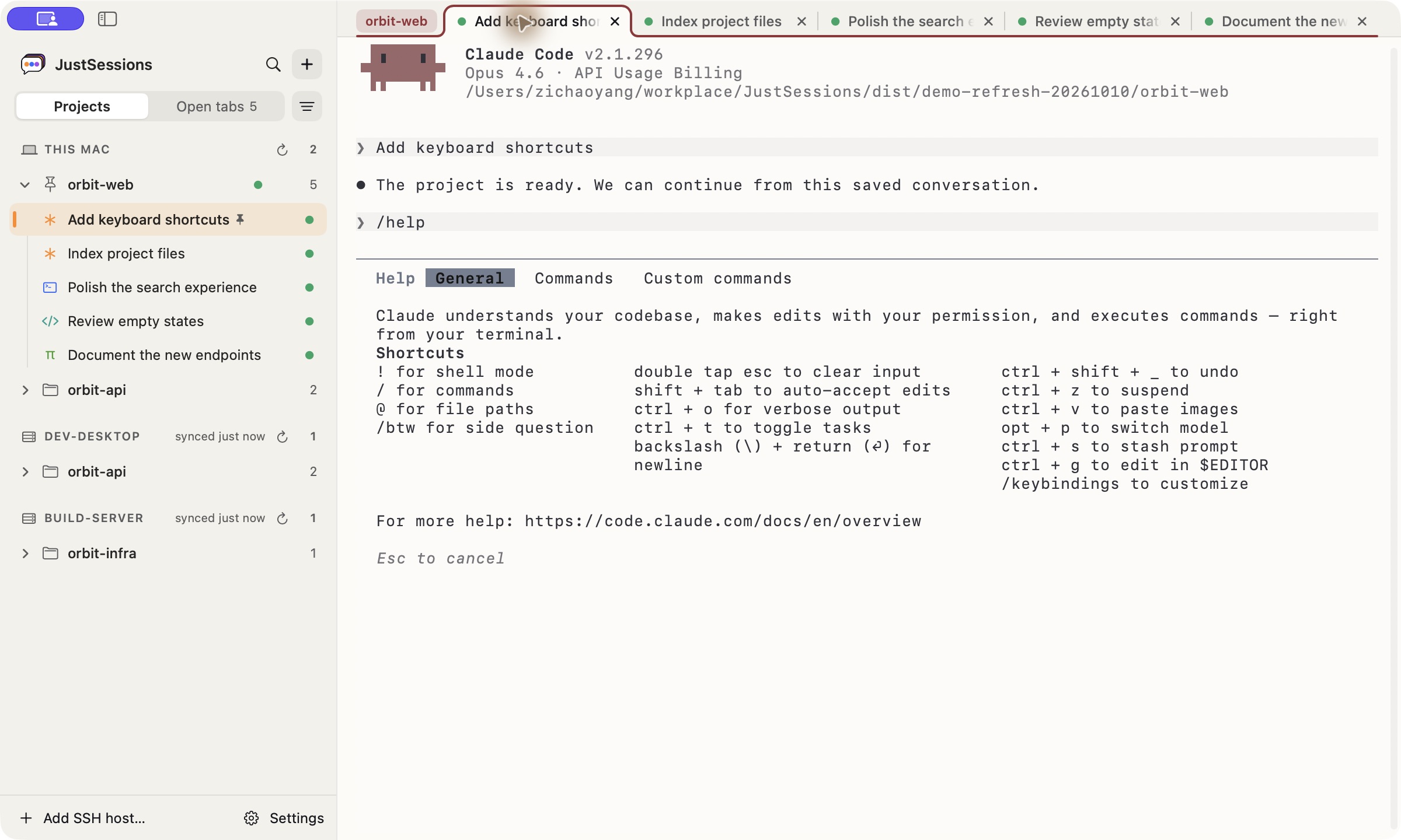 The real Claude Code CLI running in JustSessions, with the Projects sidebar grouping two Claude Code sessions, Codex, OpenCode, and Pi under one project