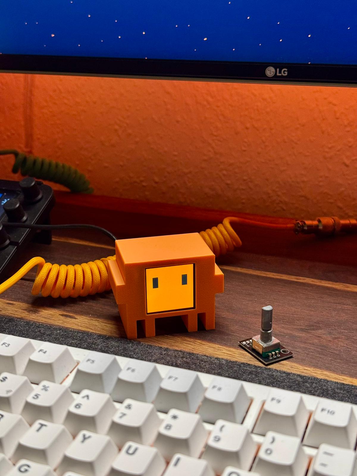 Assembled Clawd Mochi on a desk