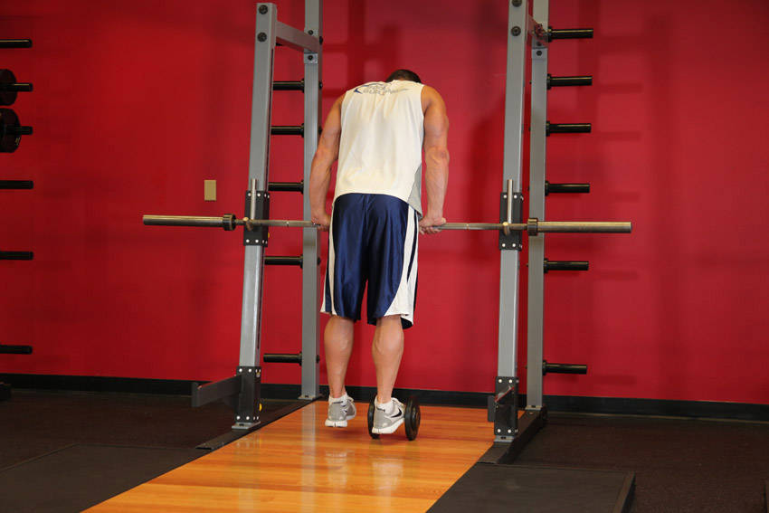 Calf Raise On A Dumbbell reference position 1
