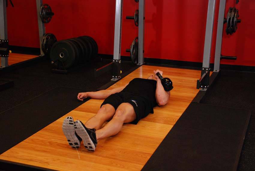 One-Arm Kettlebell Floor Press reference position 1