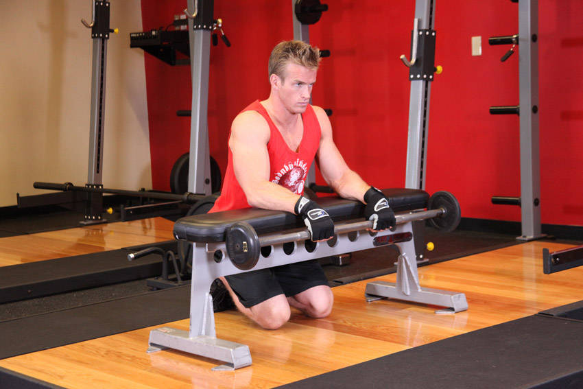 Palms-Down Wrist Curl Over A Bench reference position 1