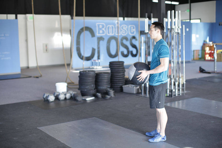 Standing Two-Arm Overhead Throw reference position 1