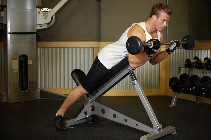 Ending position of Barbell Curls Lying Against An Incline